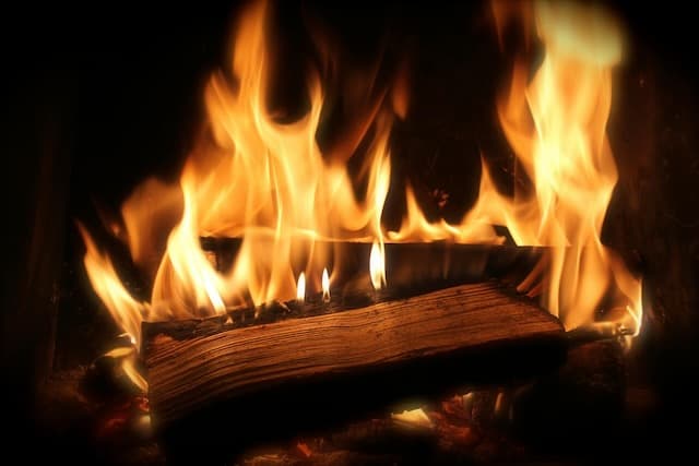 Warm interior fireplace at Villa Mtashi after a day outdoors